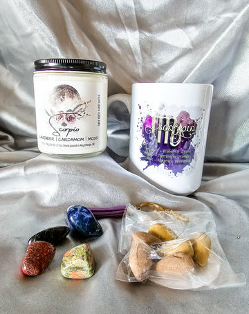 Scorpio zodiac candle gift box with mug, tumbled stones and incense cones.